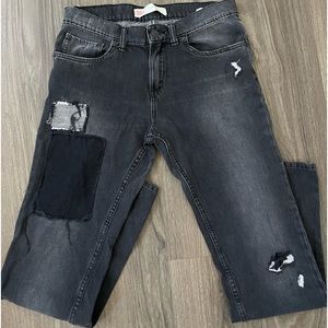 Levi’s patched black jeans